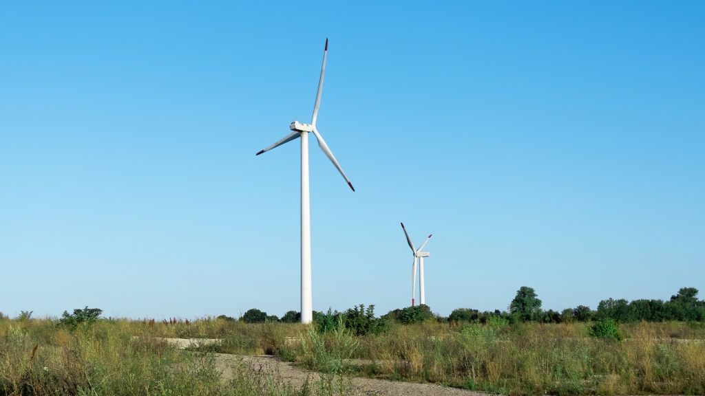 modern-wind-turbines-against-blue-sky.jpg